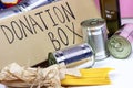 Donation carton box with food pasta, cans, beans and other. Volunteering and social assistance, charity concept