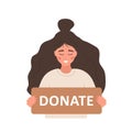 Donation and charity concept. Volunteer woman holding in hands cardboard sign Donate. Support for homeless and poor Royalty Free Stock Photo