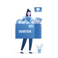 Donation concept banner. Happy woman holds box with donations. Toys and money in box. Female volunteer collected charity donations