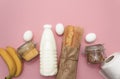 Corn, buckwheat, bananas, milk, bread in white bag on blue background