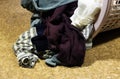 Donation o coat drive concept, Clothes heap. there is a large pile of sketched clothes in basket Royalty Free Stock Photo