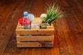 Donation volunteer box with various products for poor or elderly people on wooden background Royalty Free Stock Photo