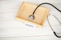 Donations and Charity. Donation Concept. Box of Donations and Heart on the White Background. Royalty Free Stock Photo