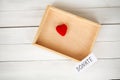 Donations and Charity. Donation Concept. Box of Donations and Heart on the White Background. Royalty Free Stock Photo