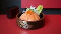 Donburi Salmon served in a Japanese restaurant in Tokyo . Japanese combo dish with chicken, rice, egg, and vegetables.