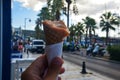 Dondurma - Popular Turkish traditional ice-cream. Women hand over a cone of ice-cream