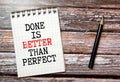 done is better than perfect - inspirational handwriting on a napkin with a cup of coffee, business concept