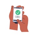 Done checkmark on mobile smart phone screen in hands. Holding smartphone with green checkbox, success symbol, approving