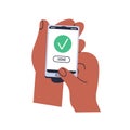 Done checkmark on mobile smart phone screen in hands. Holding smartphone with green checkbox, success symbol, approving