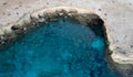 Done scenery of Cape Greko or Cape Greco sea caves Ayia Napa Cyprus. Tourist people doing sightseeing Royalty Free Stock Photo