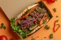 Doner kebab packaging, featuring a well-presented and appetizing kebab nestled in a to-go box, suitable for food delivery apps and Royalty Free Stock Photo