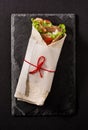 Doner kebab or shawarma sandwich on black slate background Royalty Free Stock Photo