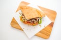 Doner Kebab top view on chopping board on white background Royalty Free Stock Photo