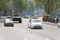 Donetsk, Donetsk People Republic, Ukraine Ã¢â¬â May 9, 2019: Police cars rides ahead column of soviet military armored technics.