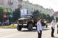 Donetsk, Donetsk People Republic, Ukraine, June 24, 2020: A convoy of military vehicles with Soviet artillery guns on a trailer