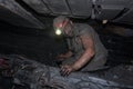 Donetsk, Ukraine - August, 16, 2013: Miner repairs coal mining c