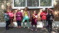 Donetsk, Ukraine - October 3, 2019. Little girls on a walk in kindergarten yard