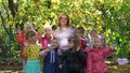 Donetsk, Ukraine - October 3, 2019. Preschool kids with teacher on a walk