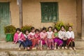 VAN, HA GIANG, VIETNAM, October 13th, 2018: Unidentified ethnic minority kids with baskets of rapeseed flower in Hagiang