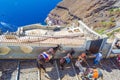 Donkeys at cobblestone path tourist attraction Santorini island Greece Royalty Free Stock Photo