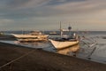 Fishing boats at sunset - Donsol Philippines Royalty Free Stock Photo