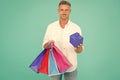 Dont delay sale today. Happy guy hold box and shopping bags. Holiday preparation. Blowout sale. Fantastic discount. Gift