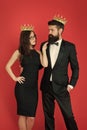 Dont go to prom alone. Prom king and queen. Sensual woman and bearded man wear prom crowns. Coronation party. Holiday