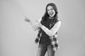 Dont just walk past. Happy girl pointing at pink background. Little kid with pointing gesture. Index fingers pointing Royalty Free Stock Photo