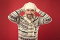 Dont let cold winter weather affect your style. Happy man in winter style red background. Mature man in casual comfy Royalty Free Stock Photo