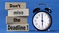 Dont miss the deadline, text words typography written on wooden blocks, business education and self development