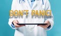 Dont Panic theme with a doctor using a tablet pc