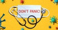 Dont Panic theme with mask and stethoscope Royalty Free Stock Photo