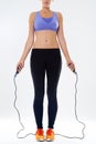 Dont skip this part. an attractive young woman holding a jump rope. Royalty Free Stock Photo