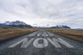 dont stop now text quote printed on asphalt road