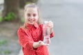 Dont wait, hydrate. Bottle of potable water selective focus. Little girl drinking water to quench thirst. Thirsty child Royalty Free Stock Photo