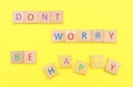 Dont worry be happy, message on yellow paper Royalty Free Stock Photo