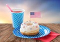 Donut with american flag decoration and drink