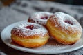 Donut berliner on white plate, Sufgania with powdered shugar and jam