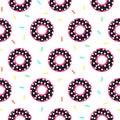 Donut black and pink sweet seamless pattern.