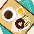 Donut breakfast with coffee and orange juice