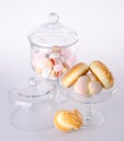 Donut, bun, cookie & glass jar on background Royalty Free Stock Photo