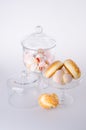 Donut, bun, cookie & glass jar on background Royalty Free Stock Photo