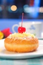 donut cake sprinkled with cheese and honey