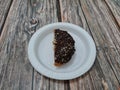 Donut cake sprinkled with chocolate messes