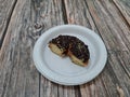 Donut cake sprinkled with chocolate messes