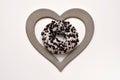 Donut with chocolate chips in the shape-heart frame Royalty Free Stock Photo