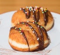 Donut with chocolate and colored candies Royalty Free Stock Photo