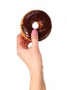 Donut with chocolate glazing in hand isolated Royalty Free Stock Photo