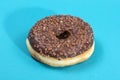 Donut covered with sweet chocolate icing