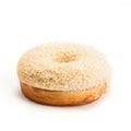 Donut with cream and coconut, isolated on white background. View from side Royalty Free Stock Photo